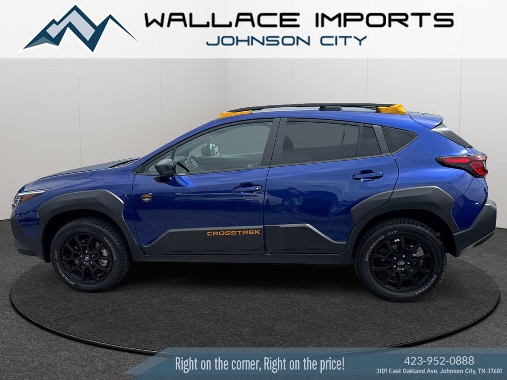 2025 Subaru Crosstrek Wilderness in Sapphire Blue Pearl — front three-quarter view