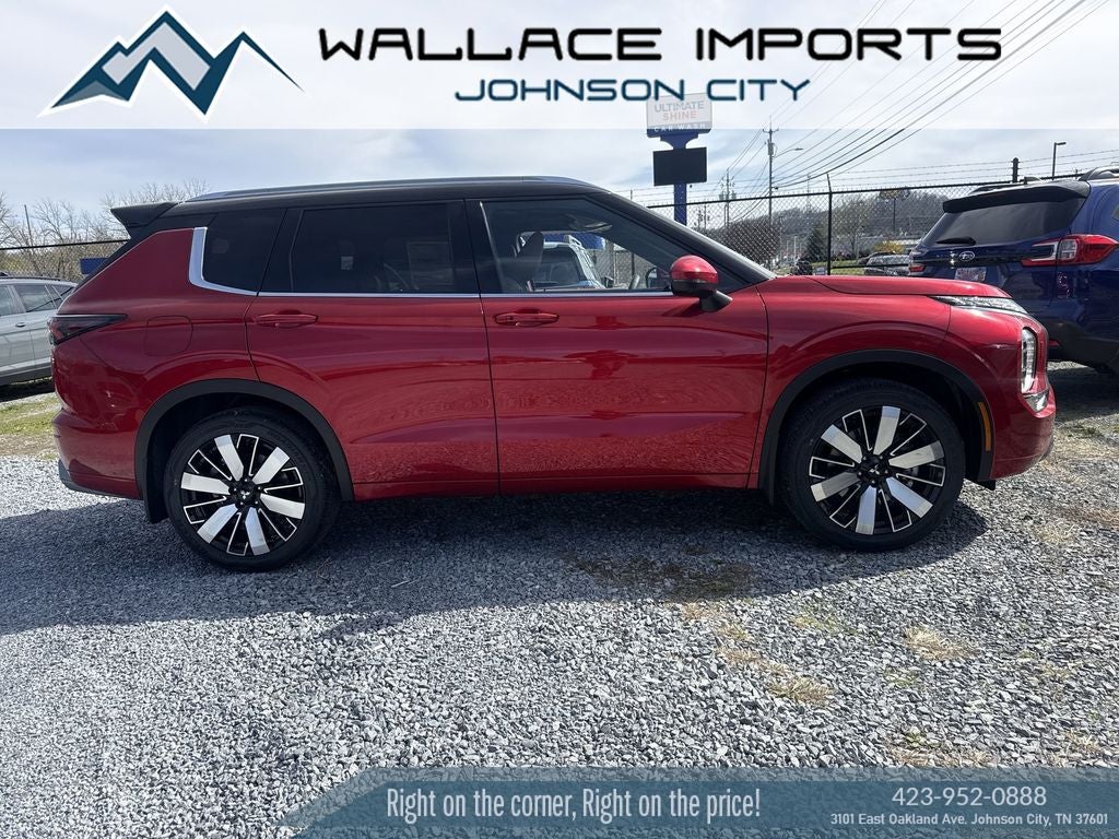 2026 Mitsubishi Outlander SEL in Red Diamond/Black Roof — front three-quarter view