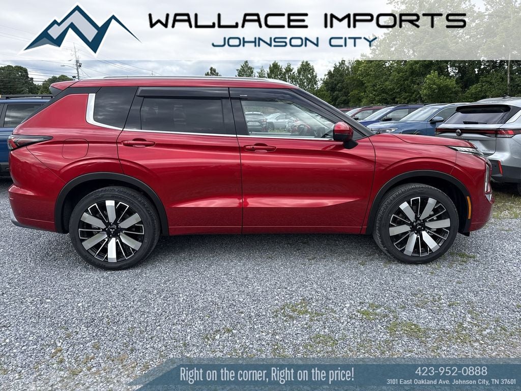 2026 Mitsubishi Outlander SEL in Red Diamond — front three-quarter view