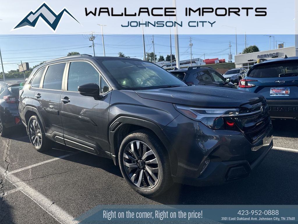 2026 Subaru FORESTER Touring in Magnetite Gray Metallic — front three-quarter view