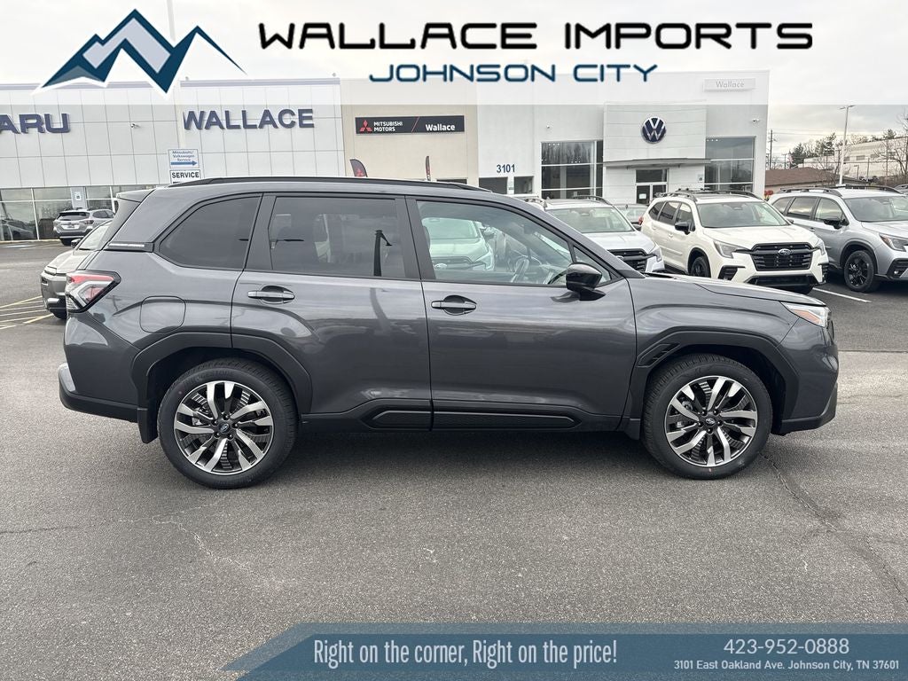 2026 Subaru FORESTER Touring in Magnetite Gray Metallic — front three-quarter view
