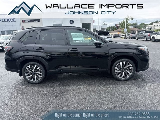 2026 Subaru FORESTER Touring in Crystal Black Silica — front three-quarter view