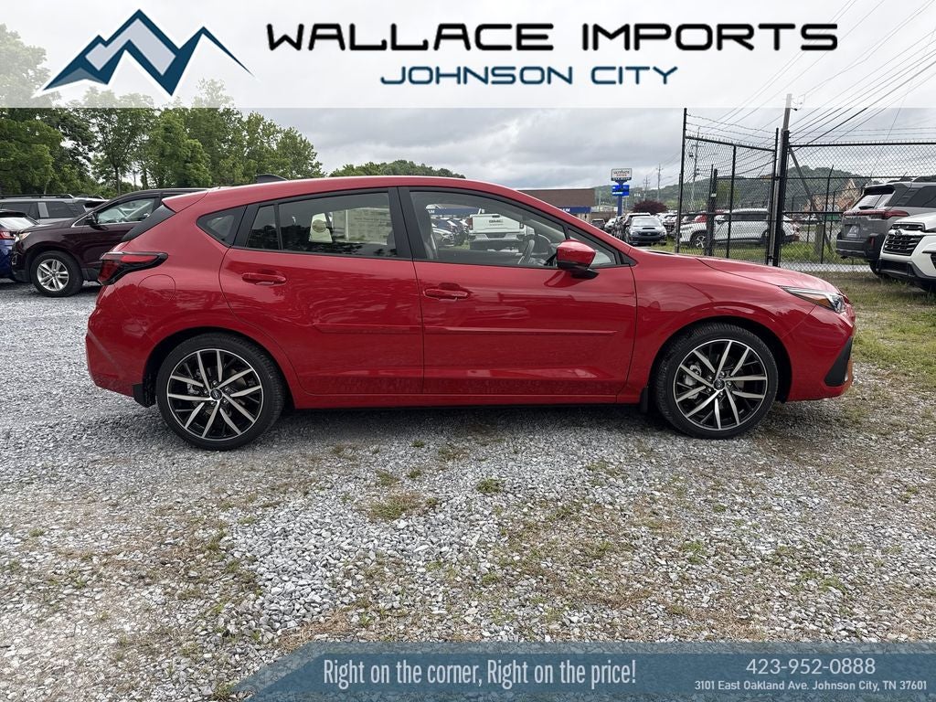 2026 Subaru IMPREZA Sport in Pure Red — front three-quarter view
