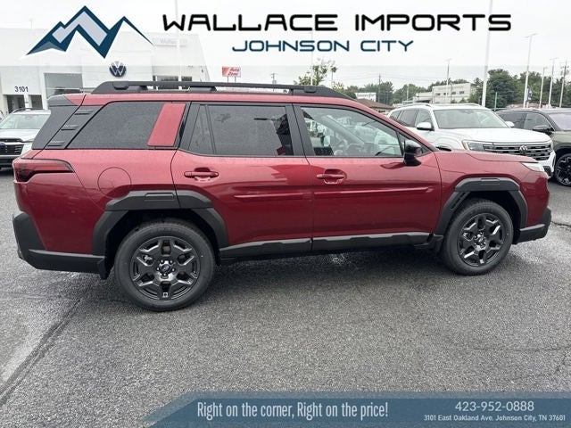 2026 Subaru OUTBACK Premium in Crimson Red Pearl — front three-quarter view
