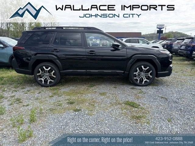 2026 Subaru OUTBACK Touring XT in Crystal Black Silica — front three-quarter view