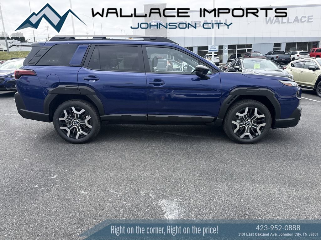 2026 Subaru OUTBACK Touring XT in Sapphire Blue Pearl — front three-quarter view