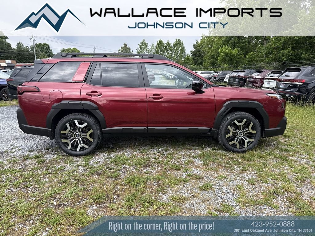 2026 Subaru OUTBACK Touring XT in Crimson Red Pearl — front three-quarter view