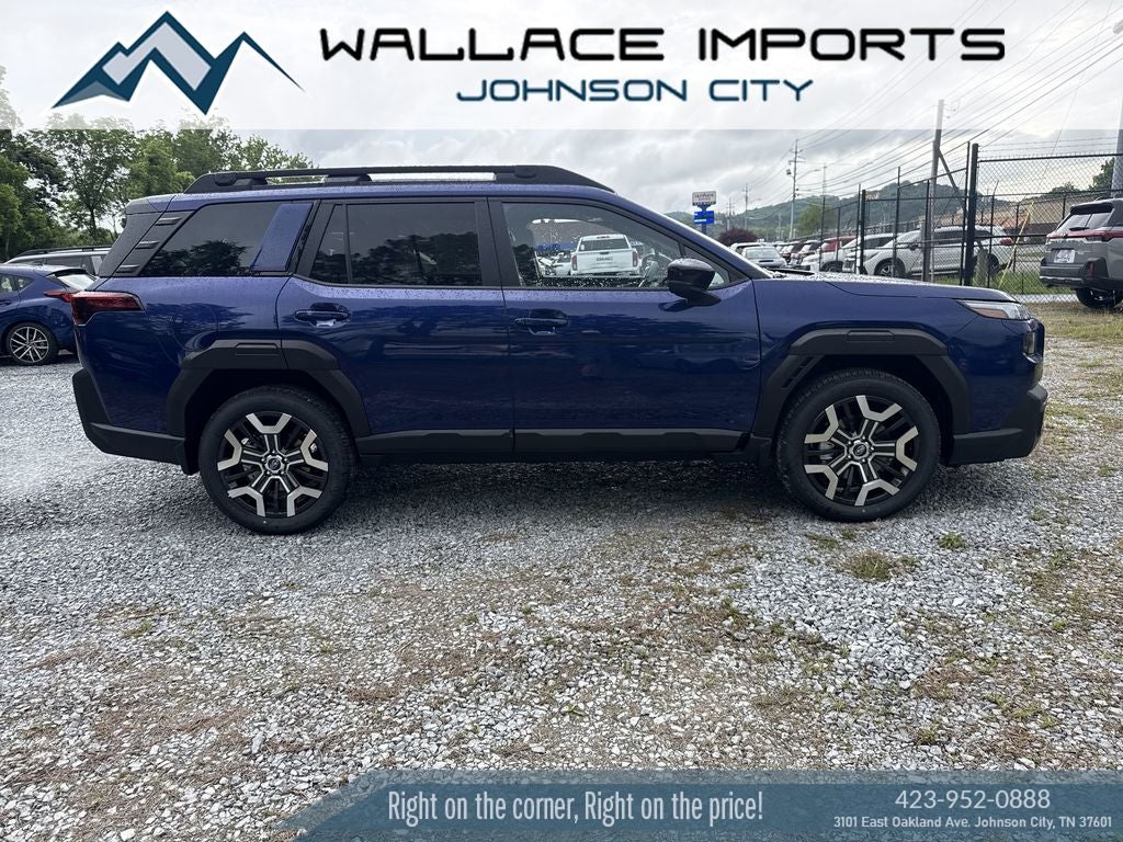 2026 Subaru OUTBACK Touring XT in Sapphire Blue Pearl — front three-quarter view