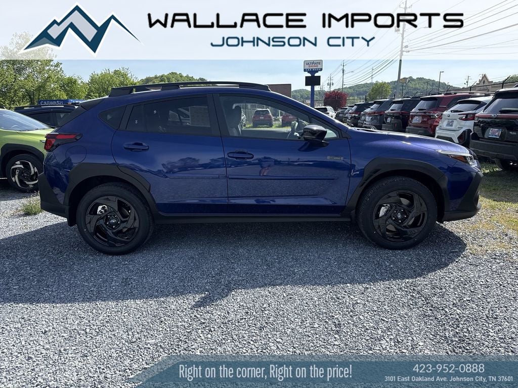 2026 Subaru CROSSTREK Sport Hybrid in Sapphire Blue Pearl — front three-quarter view